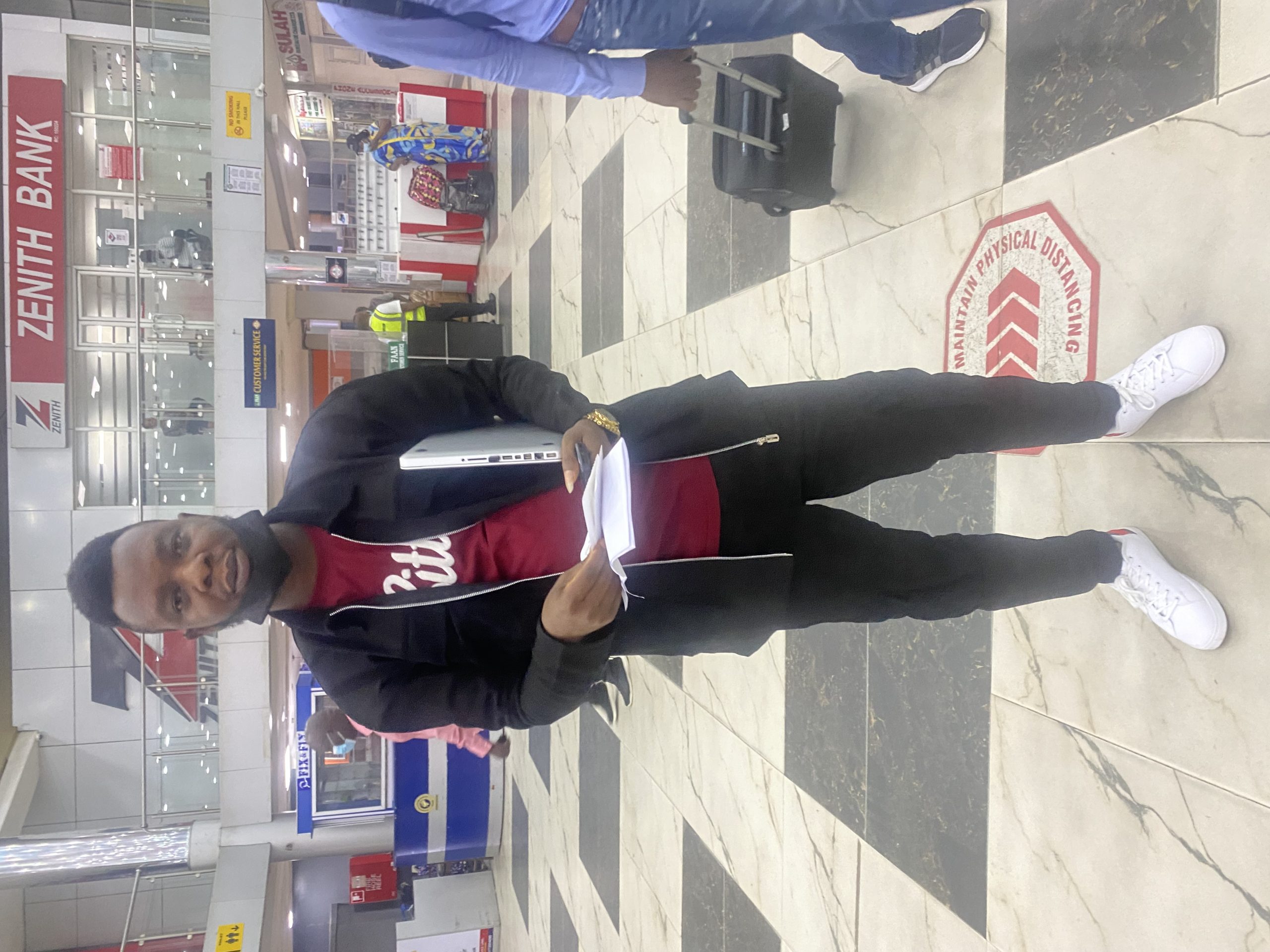 SimisolaOluwa Taiwo at airport